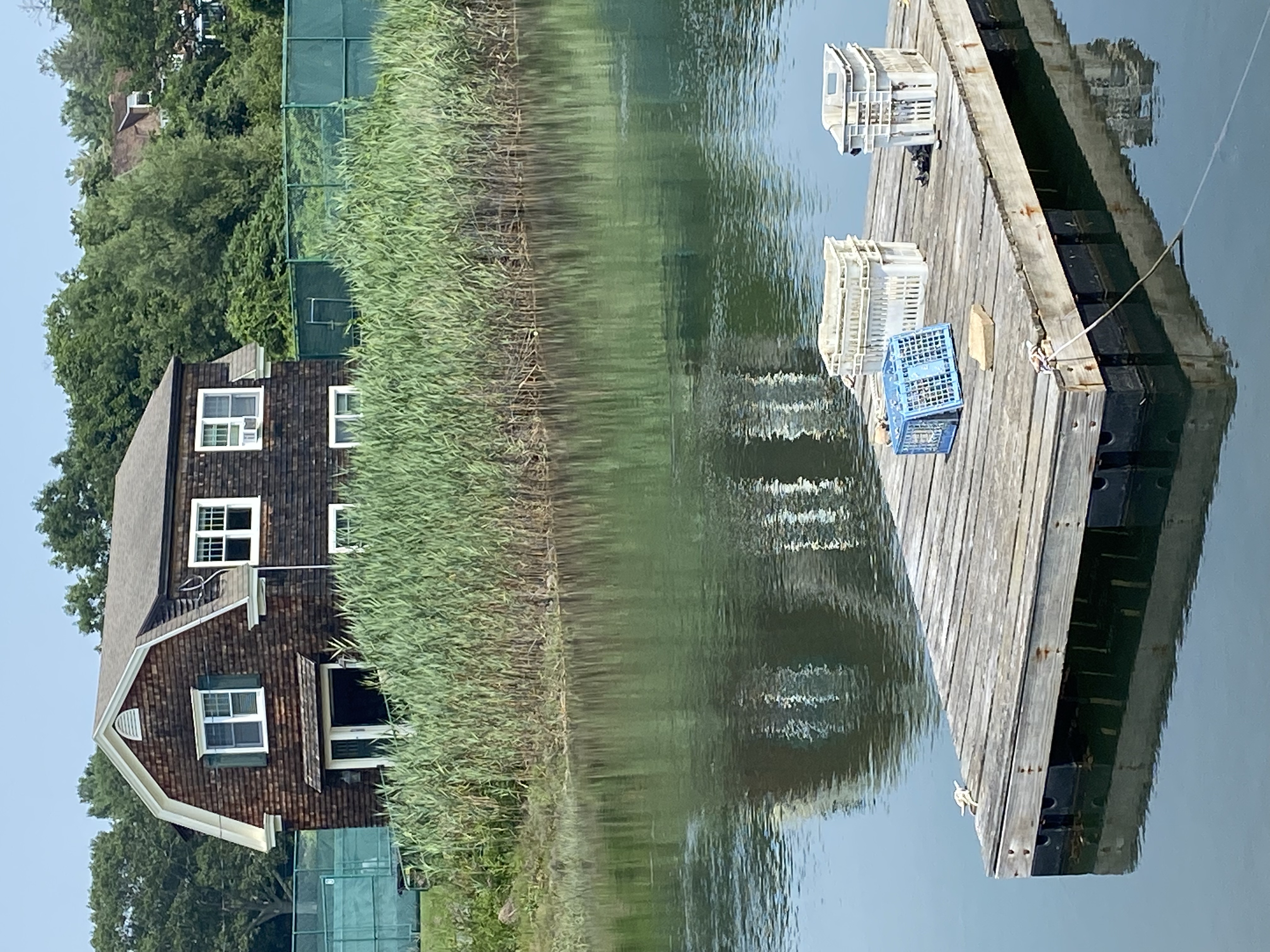 lake with brown house in kennebunkport